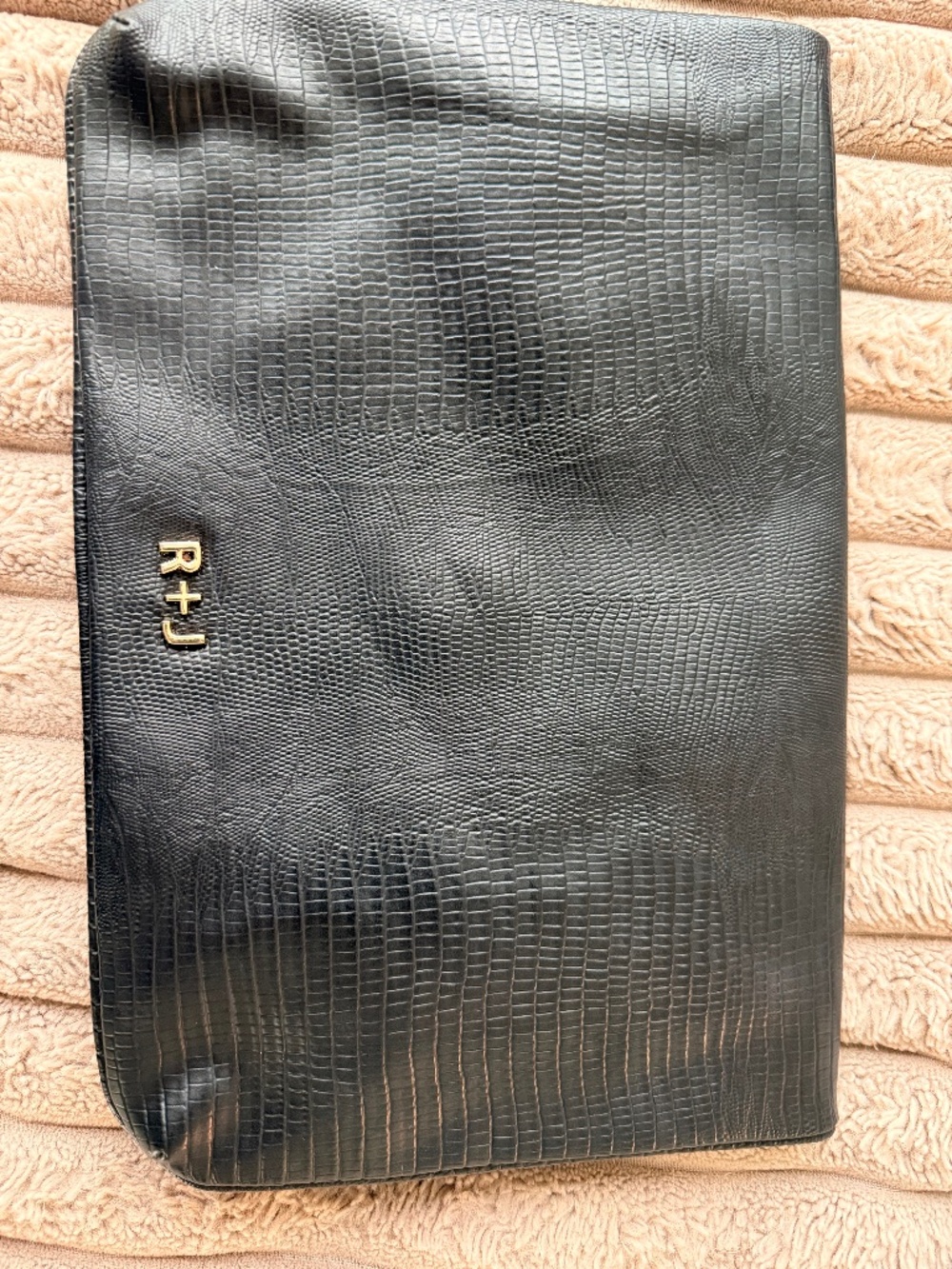 Black faux leather clutch